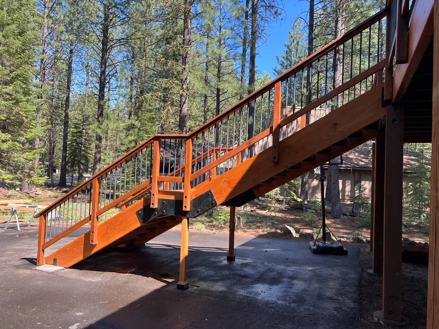 Side view of the stair stringers, posts, and steel connection brackets